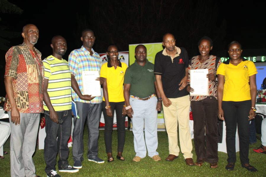 Overall winners Byamugisha and Nakalembe holding travel letters to Bwindi National Park all courtesy of Aerolink and Mahogany Springs Bwindi.