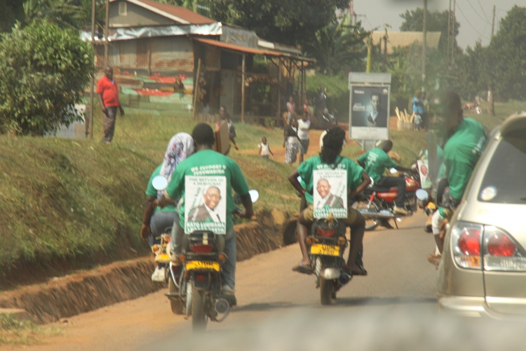 Boda Boda Riders in Green T-shirts escort Kato Lubwama's convoy.