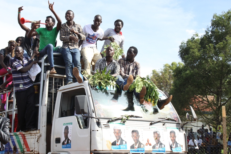 Kirumira's supporters campaign for him.