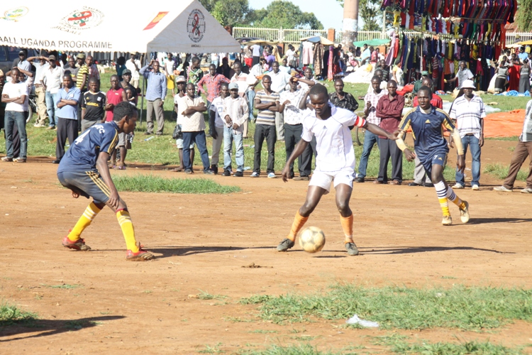 Bright Stars Captain Mandela Alex dribbles Kampala's defender Abdi Nasir.