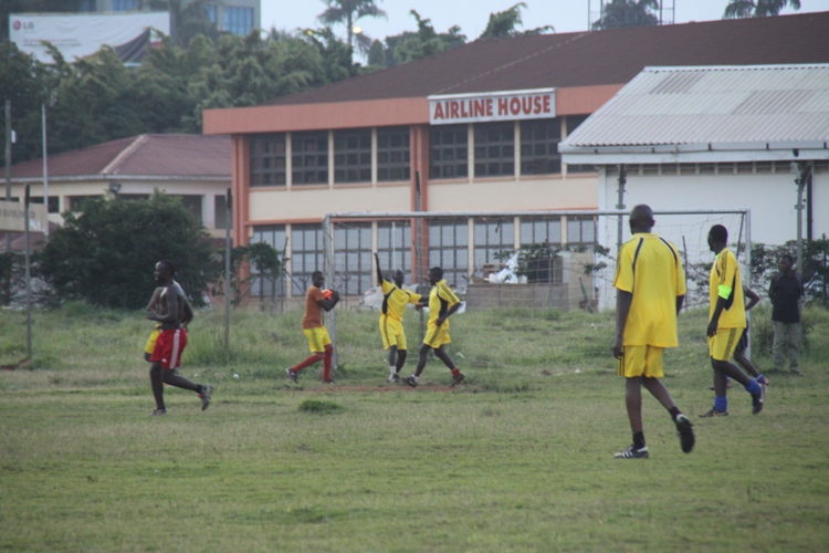 UCIFA taking on Enhas yesterday at the Airport football Ground. Left Enhas players bare chested.