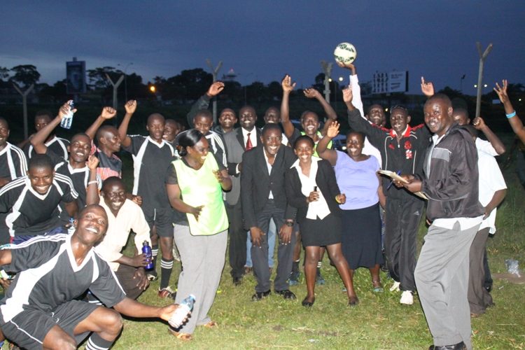 Lake Victoria Hotel team and management celebrate their 1-0 over police.