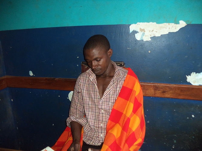 Sex Pest Julius Bazanye feeling guilty in Mpala Police cells.
