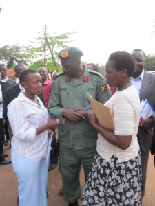 Ex-Nkumba-Guild-President-Deborah-Asasira-L-With-Gen-Aronda-Nyakairima