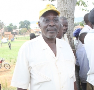 Former URA Boss George Rubasha smiling after being voted NRM treasurer for Lugonjo Nakiwogo.