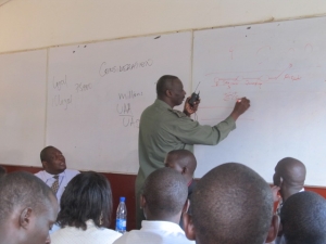 Gen. Aronda lecturing Nkumba University students in 2012.