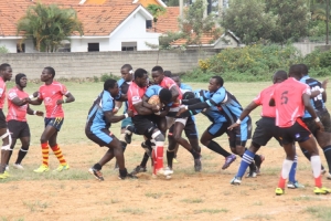 Mongers (in blue) beat Buffaloes 26-19 to storm semifinal of the Uganda Cup.Mongers-in-blue-beat-Buffaloes in the Uganda Cup Semifinals.