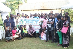 Youth pose for a photo with Division A Chairman Kasule David Wasswa at Victoria Region Motel.
