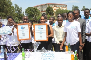 Harriet Kibi (in black dress) with Nkumba University shool of Business Administration students.