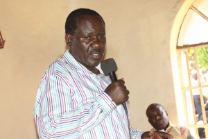 Mukubabysi attacking government during the requiem mass.