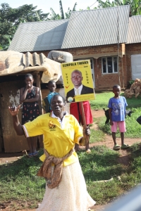 A Sempala supporter parading his poster.