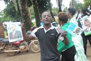 Besigye supporter campaigning during the DP Nominations at the Municipal council offices.