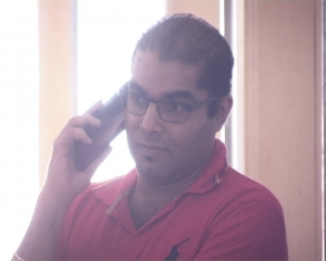 Fish Ways Boss safaraz pretending to be making calls.