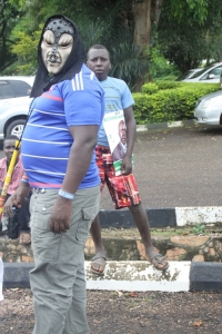 Kayanja supporter dressed in a mask.