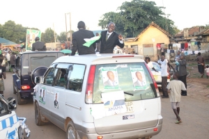 LCV Councilor Aspirant Maggwa Ssali smiling non-stop.