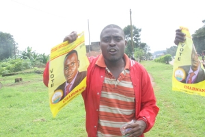 Michael Mutebi's supporters downing pints.
