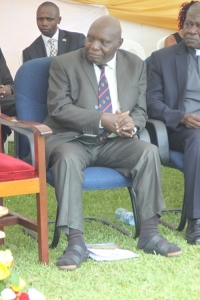 Prof. Sebuwufu in open shoes.