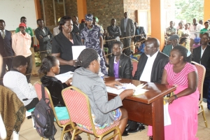 Stanley Namayirira (C) being nominated at the Entebbe Municipal council offices on Tuesday.