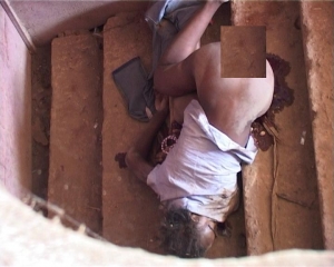 The deceased' body in storied building.