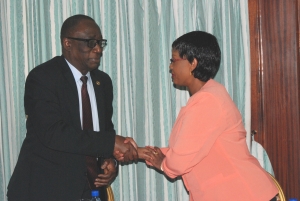 Aguibou Diarrah   the AUBP Boss in Ethiopia shakes hands with Minister Najjemba.