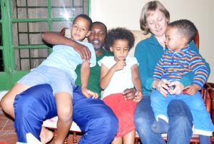 Amos Wekesa with Zungu babe Amy Wekesa with kids.