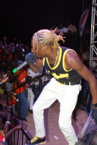 Coco finger on stage.