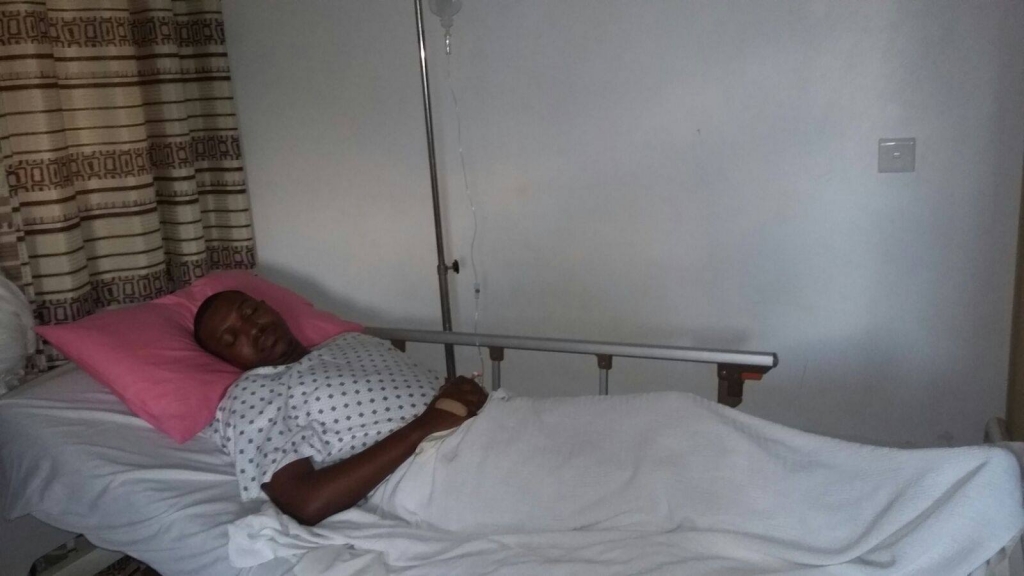 Fabrice Rulinda on hospital bed.