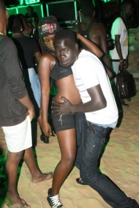 Fella feeling babe's hips.