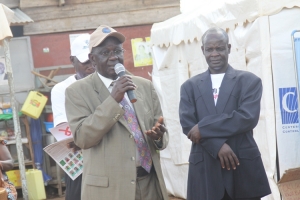 Former Uganda Aids Commission Boss Dr. Kihumuro Apuuli speaking at the Worlds Aids Day Celebrations in Entebbe.