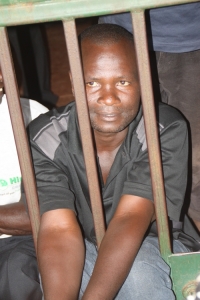 Isaac Lutaaya inside the court cells.