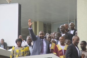Kyabazinga waves to his subjects shortly after arriving at Entebbe Airport.