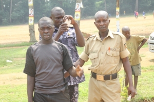 Police Officer arresting Taxi driver after presenting fake driving permit.