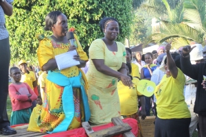 Rose Tumusiime and Peace Salamuka begging for votes.