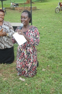 Rose Tumusiime begging for votes from the youth.