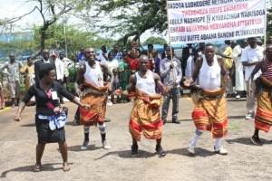 Traditional dancers welcome Gabula Nadiope at the Airport.
