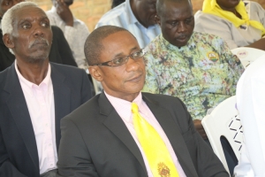 Busiro South NRM Party Flag bearer Peter Ssematimba listening attentively.