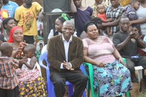 MP Aspirant Archilles Kiwanuka with his supporters at the Campaign rally in Kitooro.
