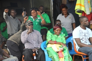 NRM LCI Chief Paul Zikuliza with DP Flag bearers.