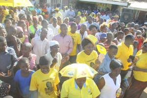 NRM Party die-hards listen to Rose Tumusiime's campaign message.