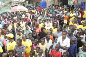 Supporters listening attentively to Rose Tumusiime's campaign message.