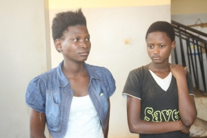 Traumatized Glorious Akankwasa (R) with Shakina Ayub who survived the sex pest.