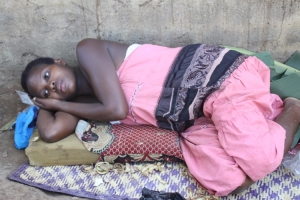 Nakatto Prossie in pain after she was severely beaten.