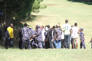 Police cops calm down the situation. They were accused of a turning a blind eye as chaos erupted.