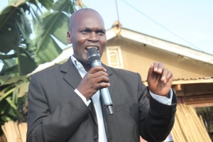 Councilor Godfrey Sendyose Sebagala speaking at a past DP Rally in Kitooro.