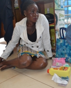 Florence sweating plasma after she was netted. Right are some of the items that she had stolen from the supermarket.