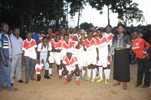 Tagy High School with trophy.