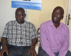 Wilson Sengonzi(in purple shirt) and Kizito Samuel the bonafide land owners.