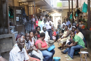 Baita Market Vendors listen during the meeting. 