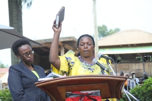 Councilor Nasamba Rebecca biting tongue.