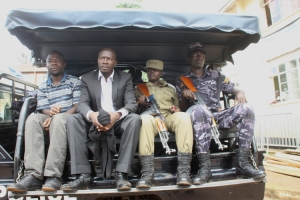 FDC Boss Gitta Alex on Police Vehicle heading to court.